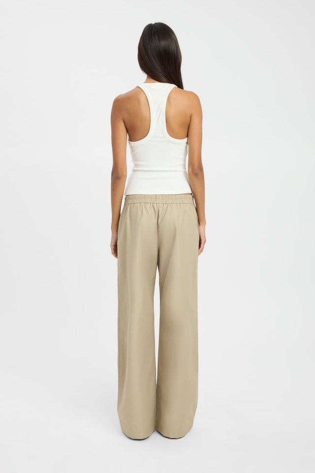 Featuring the Tisha Tank womens blouse in ivory with fitted sleeveless design back