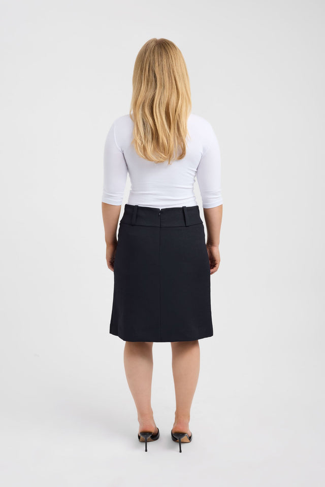 Featuring the Ariel Low Rise Midi Skirt womens-skirts with straight hem, knee length, and black color detail